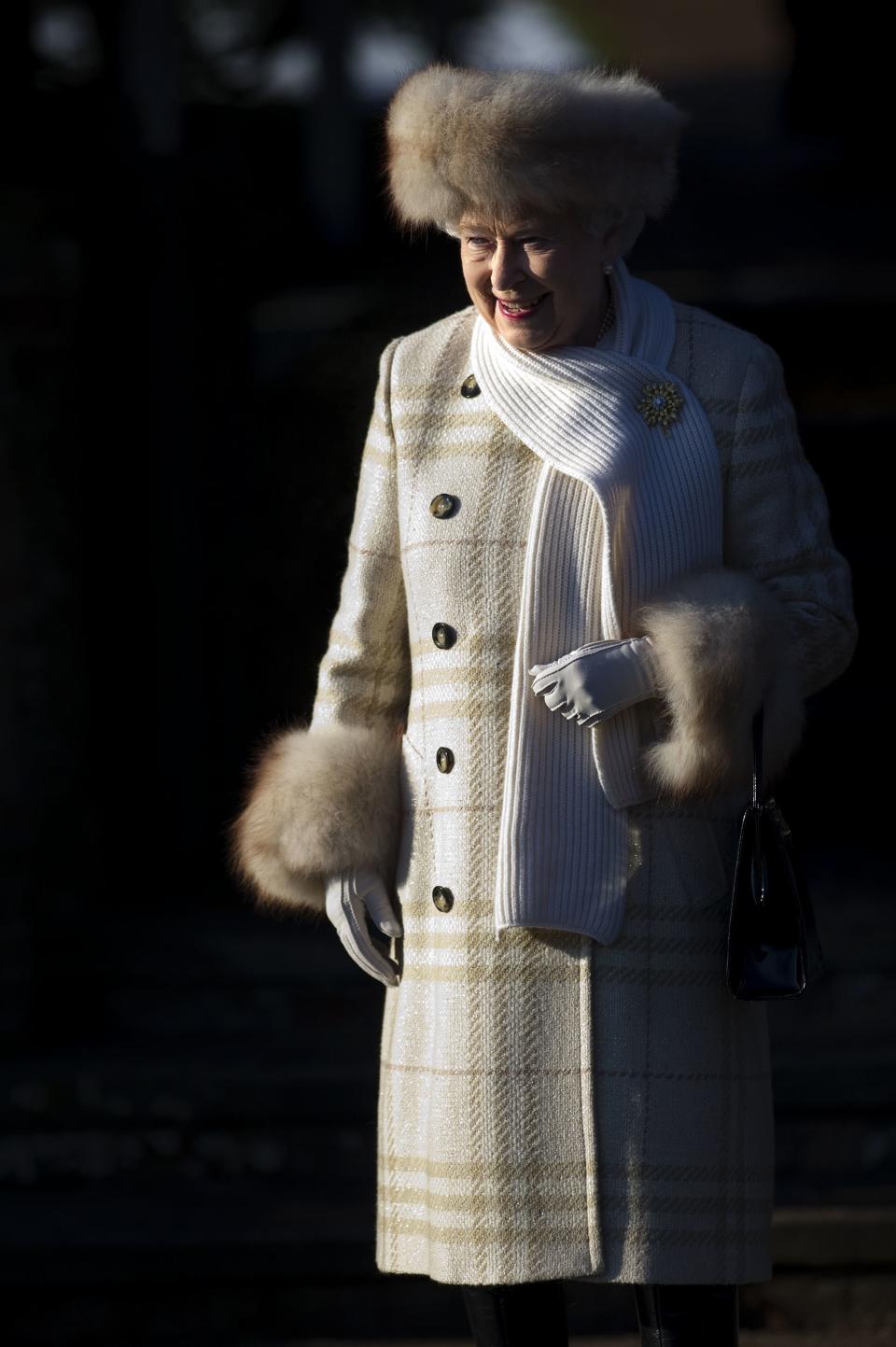 Queen Elizabeth II has been photographed wearing fur for decades. She wore a fur-trimmed hat and coat to a Christmas Day church service in 2010.