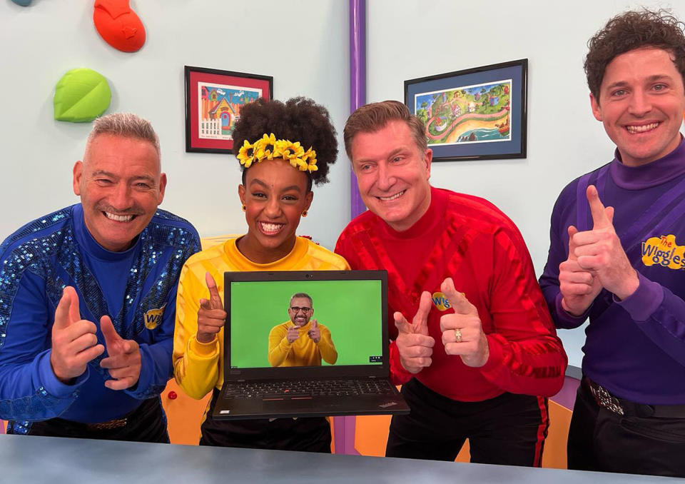 The Wiggles with Steve Carell who is on a computer screen