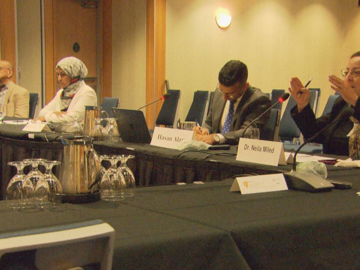 Members of B.C.'s Muslim community gathered at a public hearing in Vancouver to share their experiences and research, and talk about what needs to be done to address Islamophobia.  (CBC News  - image credit)