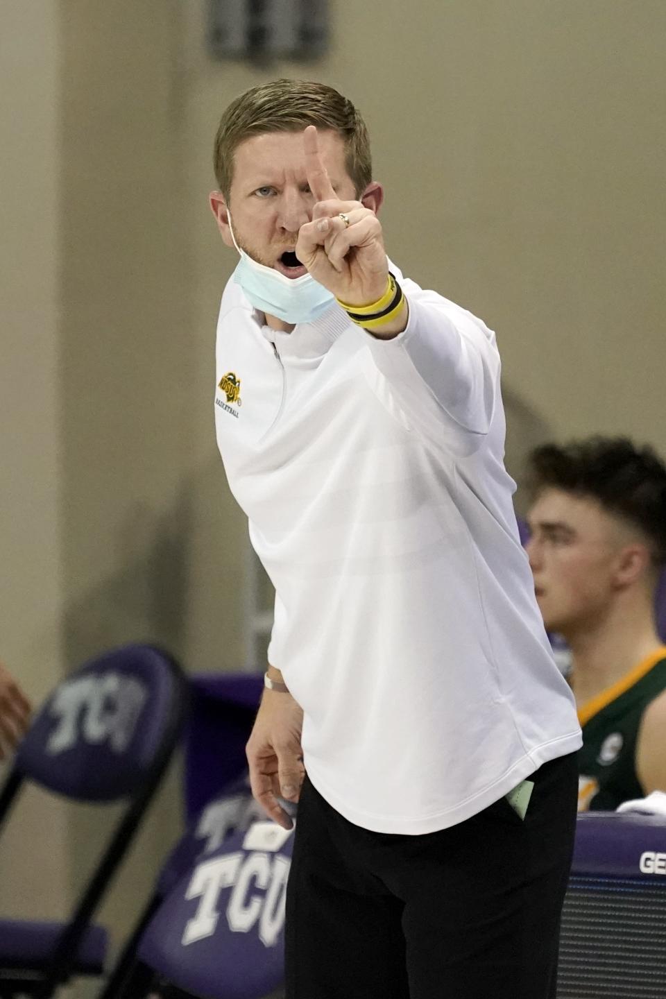 North Dakota State coach David Richman gestures during the second half of the team's NCAA college basketball game against TCU in Fort Worth, Texas, Tuesday, Dec. 22, 2020. (AP Photo/Tony Gutierrez)