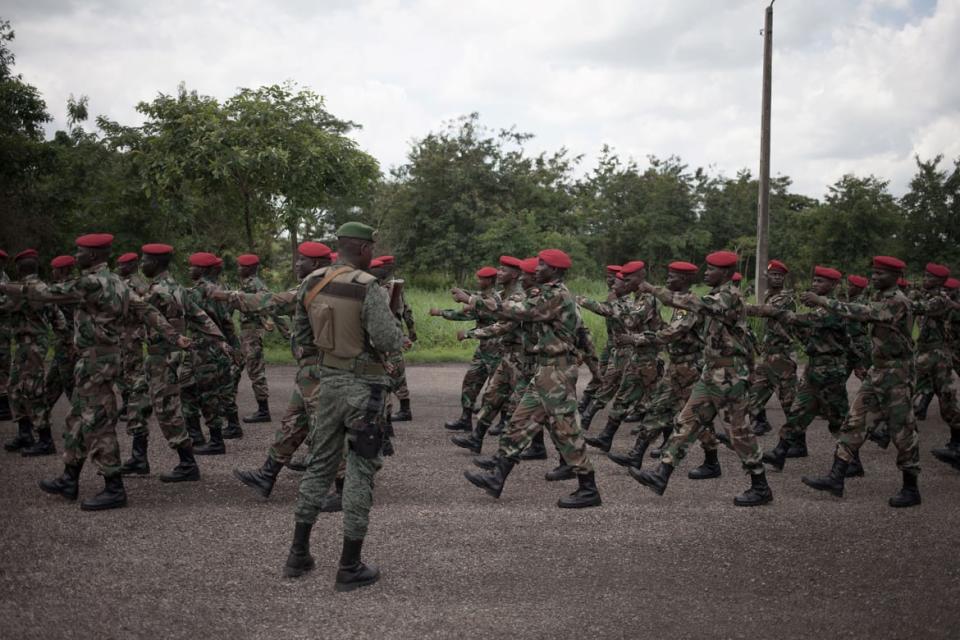 <div class="inline-image__caption"><p>New recruits for the Central African Armed Forces (FACA) march in formation during an award presentation in Berengo on August 4, 2018.</p></div> <div class="inline-image__credit">Florent Vergnes/AFP via Getty Images</div>