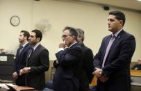 From left to right, attorney Adam Rosengard, representing Dean Smith; attorney Thomas Mirigliano, representing Kimberly Arendt; defense attorney James Lisa, representing John Cramsey; and Hudson County Assistant Prosecutor Thomas Zuppa appear before Hudson County Superior Court Judge Mitzy Galis-Menendez during the Holland Tunnel weapons case in Jersey City, N.J. (Ed Murray/NJ Advance Media via AP, Pool)