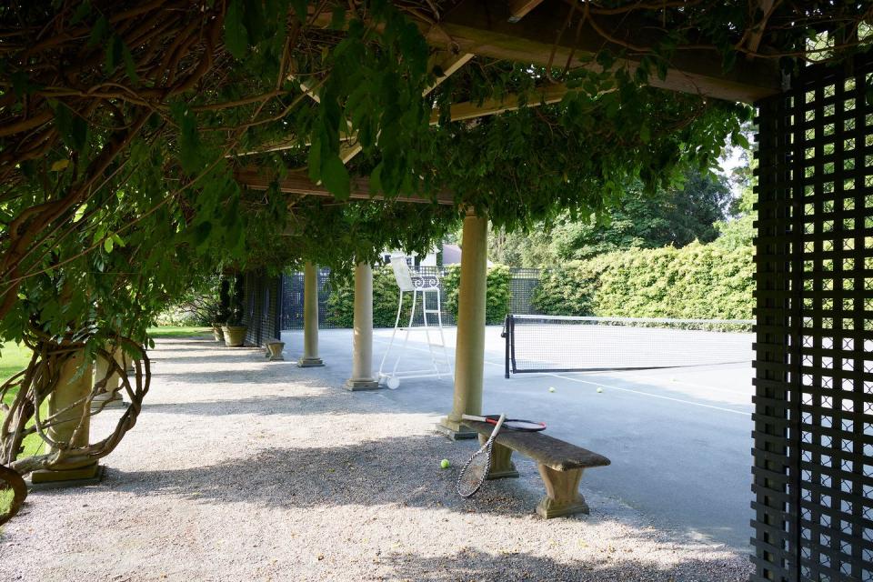 a bench under a covered area