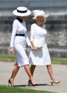 <p>The Duchess of Cornwall greets Melania Trump at Buckingham Palace for an official welcome. Both women are wearing shades of white and hats for the occasion.</p>