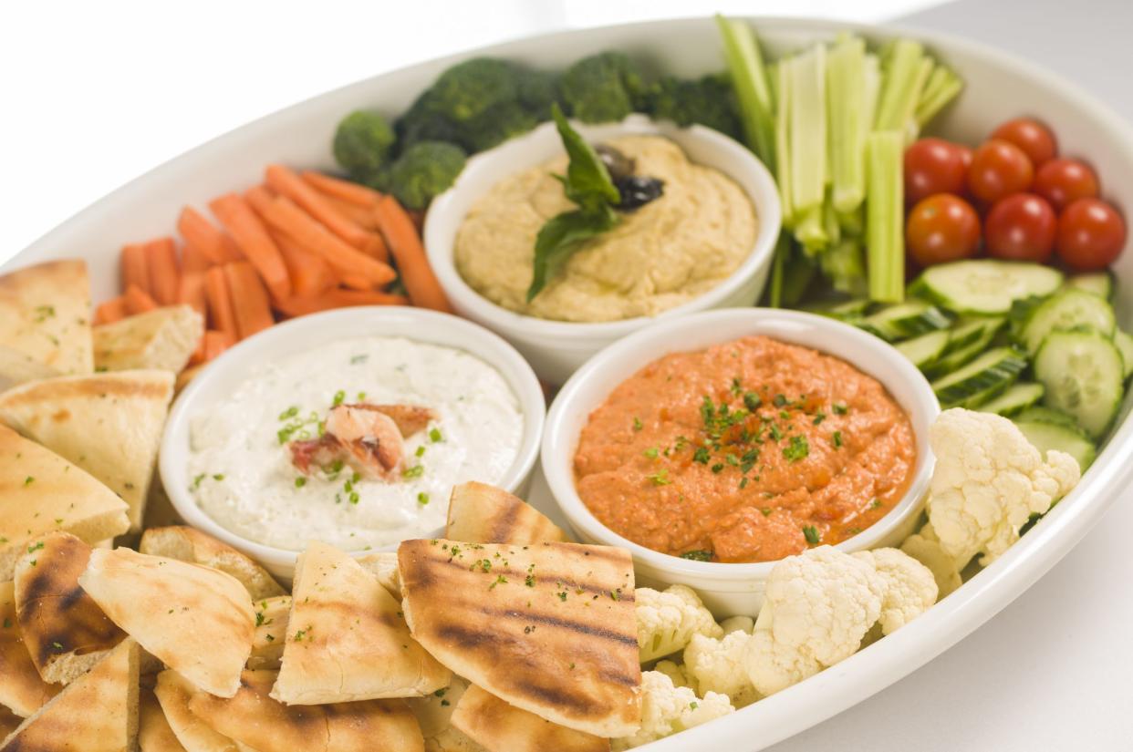 Gourmet dips with pita bread and veggies