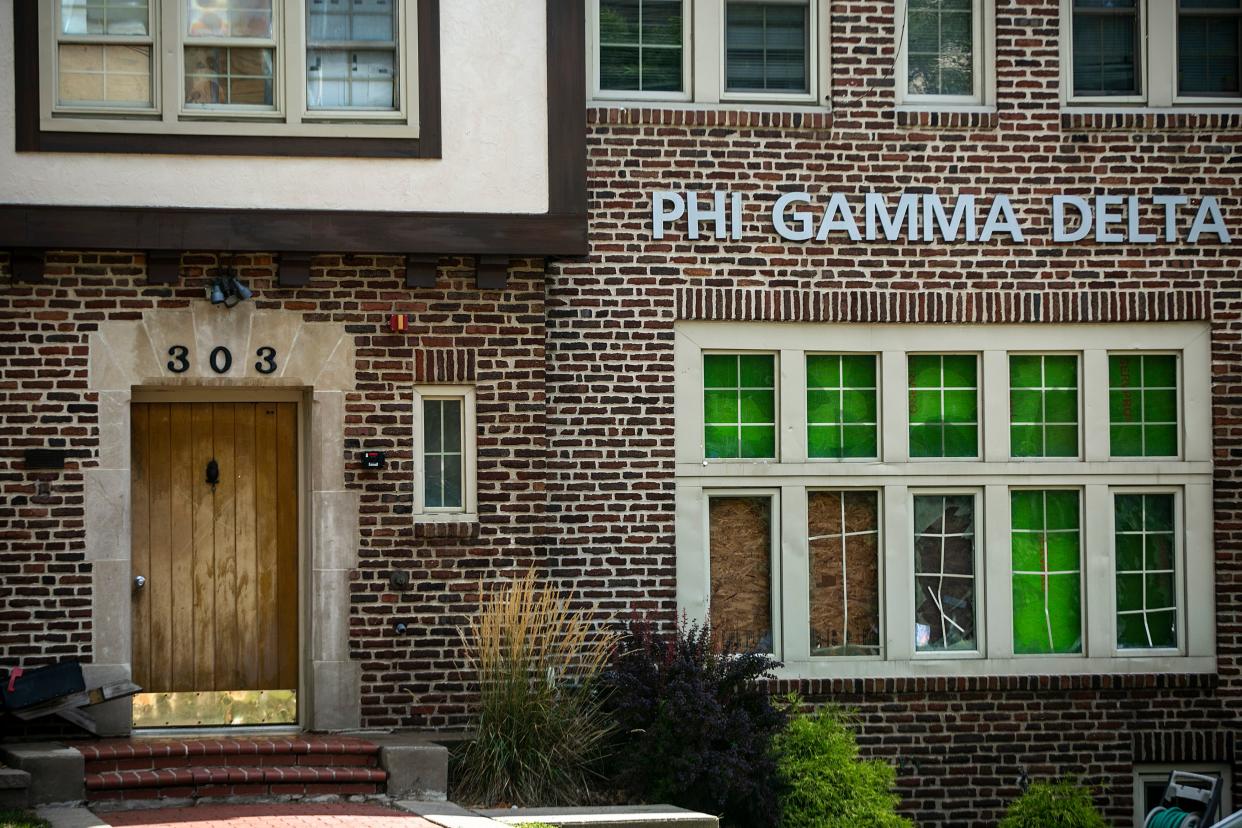 Windows are boarded up at the Phi Gamma Delta chapter at the University of Iowa, Wednesday, Sept. 1, 2021, in Iowa City, Iowa.