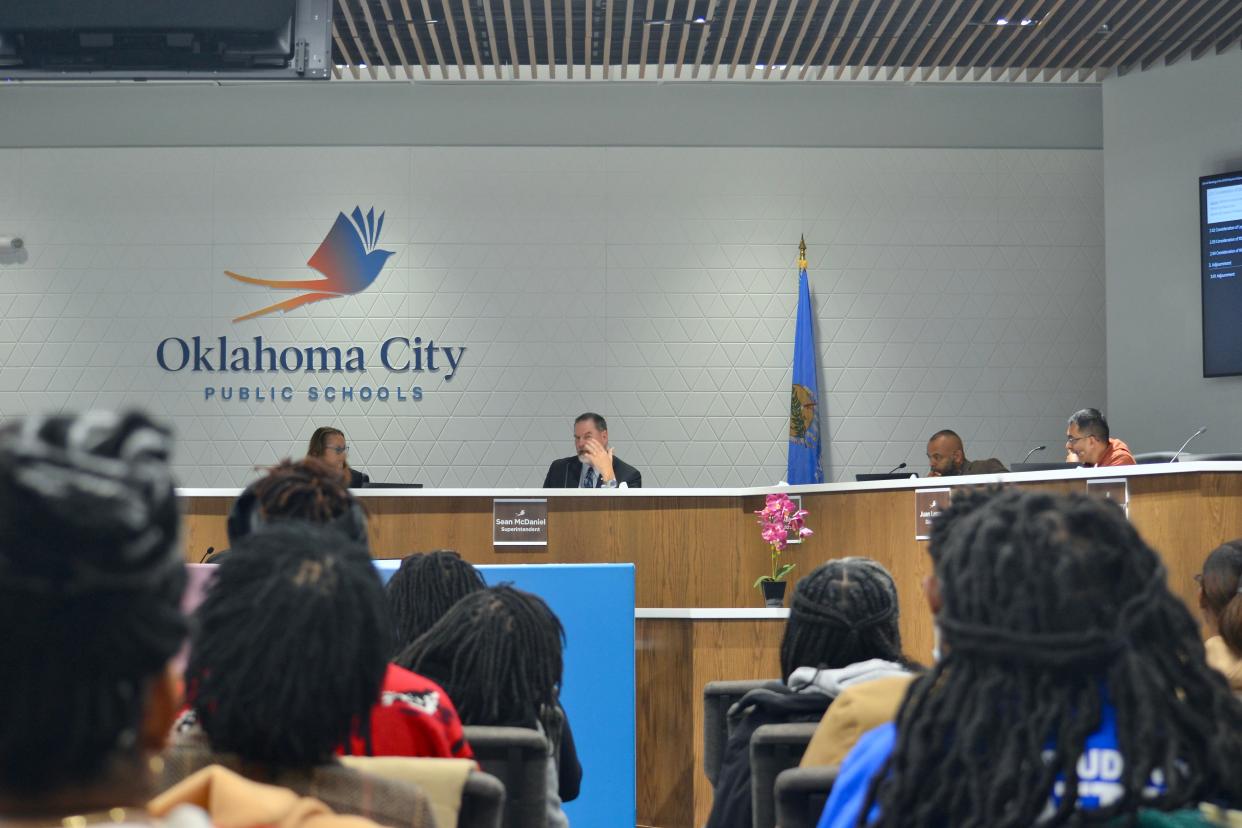 Oklahoma City Superintendent Sean McDaniel speaks at a school board meeting Monday. McDaniel and a committee of evaluators recommended the board deny four charter school applications during the meeting. The board approved one of the schools and invited the other three to reapply.