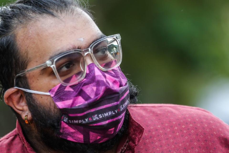 Muralikrishnaa Gopalakrishnan, 30, speaks to Malay Mail during an interview at Batu Caves on Thaipusam January 18, 2022. — Picture by Hari Anggara