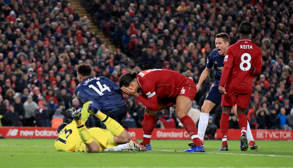 Jesse Lingard pounces to score United’s goal after Allison spills a Lukaku cross