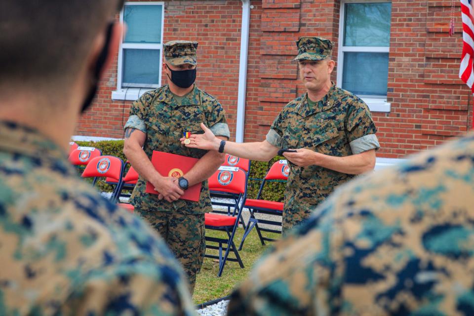 U.S. Marine Corps Maj. Gen. Frank Donovan, the Commanding General of 2d Marine Division, addresses the audience after awarding Sgt. Danny McDonald, scout sniper with 2d Battalion, 6th Marine Regiment, 2d Marine Division, the Navy and Marine Corps Medal at Camp Lejeune, N.C., March 17, 2021. (U.S. Marine Corps photo by Cpl. Elijah Abernathy)