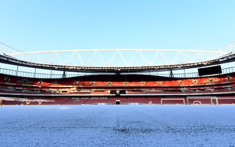 Emirates pitch covered in snow - Credit: Getty images