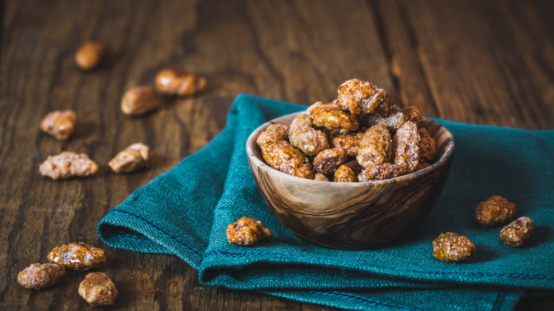 sugared almonds in bowl with towel