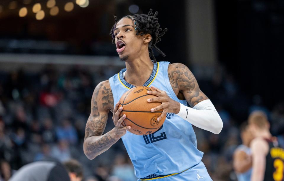 Memphis Grizzlies guard Ja Morant (12) was injured during the first quarter of Saturday's game against the Atlanta Hawks.