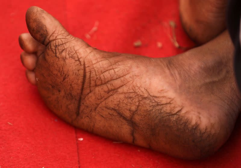 The sole of a farmer's foot is seen during a protest against new farm laws in Mumbai