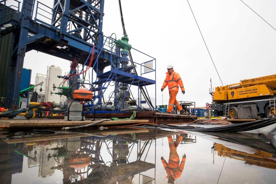 A worker at the Cuadrilla fracking site in Preston New Road in Lancashire (PA Archive)