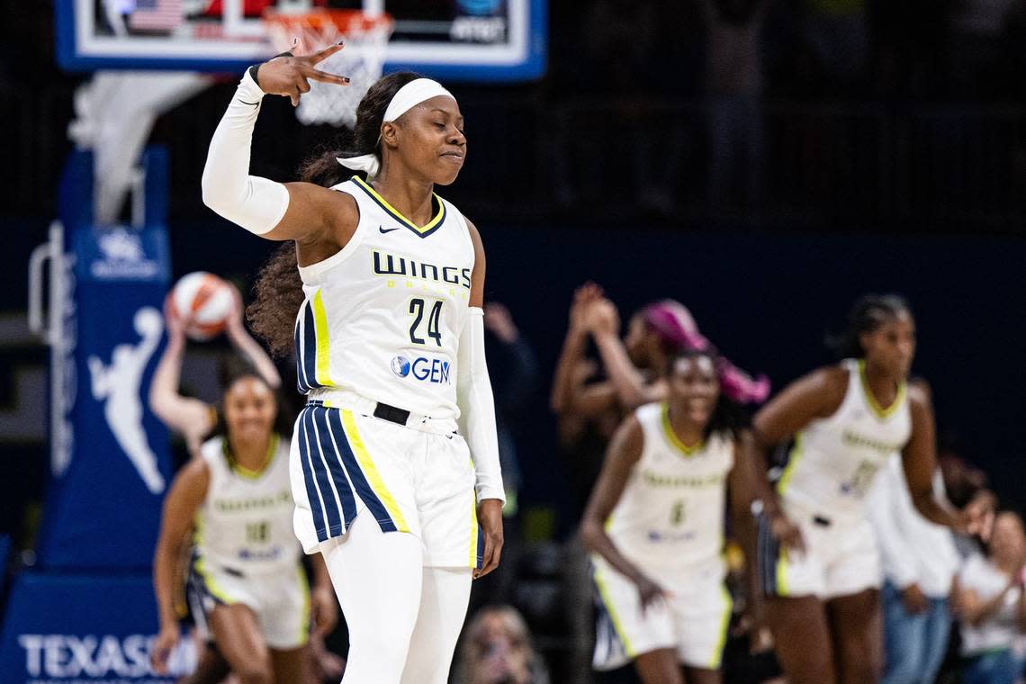 Dallas Wings guard Arike Ogunbawale (24) celebrates after making the game-winning, three-point shot in the fourth quarter of a WNBA preseason game between the Dallas Wings and Indiana Fever at College Park Center in Arlington on Friday, May 3, 2024.