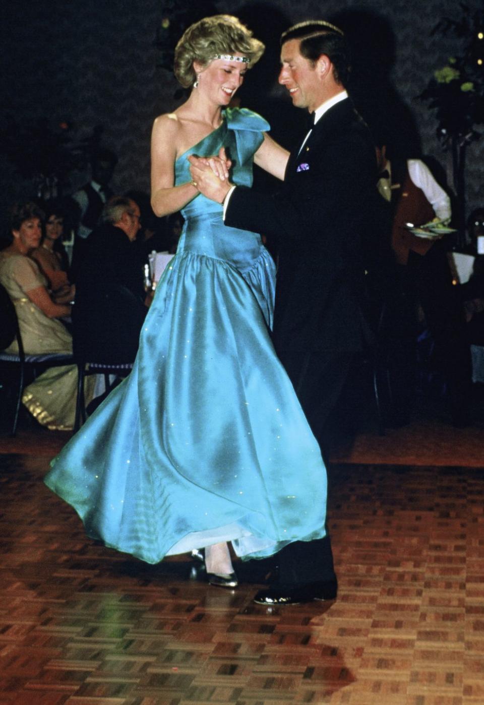 <p>For a 1985 appearance in Melbourne, Australia, the <a href="http://www.goodhousekeeping.com/life/entertainment/news/a36449/princess-diana-dresses-kensington-palace/" rel="nofollow noopener" target="_blank" data-ylk="slk:fashion icon;elm:context_link;itc:0;sec:content-canvas" class="link ">fashion icon</a> accented her gown with an emerald-and-diamond choker — but she wore it as a tiara. We're pretty sure that wasn't quite how <a href="http://www.goodhousekeeping.com/life/entertainment/news/a33950/queen-elizabeth-princess-diana-book/" rel="nofollow noopener" target="_blank" data-ylk="slk:the Queen;elm:context_link;itc:0;sec:content-canvas" class="link ">the Queen</a>, who gave the necklace as a wedding gift, imagined the art deco treasure being displayed.<br></p>