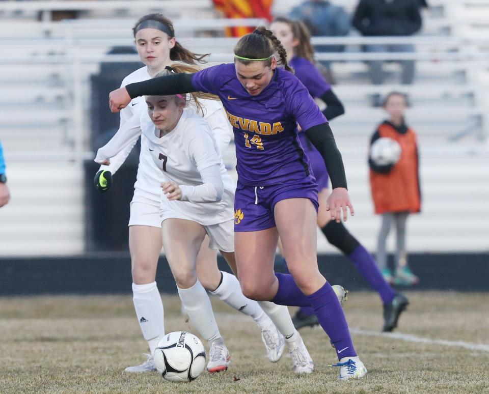 Evelyn Anderson (14) is part of a talented defense back four that provided outstanding support to new Nevada keeper Joslynn Farmer in her varsity debut against rival Gilbert Monday at Cub Stadium in Nevada.