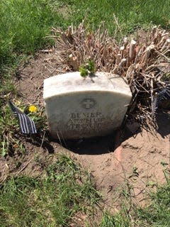 Elmer Trout's headstone before restoration