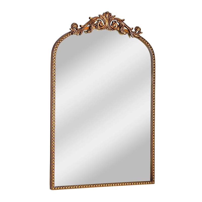 Filigree arched wall mirror made of metal