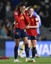 Spain's Salma Paralluelo, left, reacts with a teammate Ona Batlle after defeating Sweden in the Women's World Cup semifinal soccer match at Eden Park in Auckland, New Zealand, Tuesday, Aug. 15, 2023. (AP Photo/Andrew Cornaga)