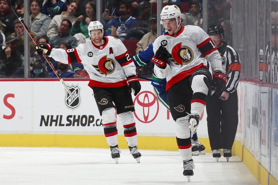 VANCOUVER, BC - APRIL 19: Alex Formenton #10 of the Ottawa Senators celebrates after scoring during their NHL game against the Vancouver Canucks at Rogers Arena April 19, 2022 in Vancouver, British Columbia, Canada. (Photo by Jeff Vinnick/NHLI via Getty Images)