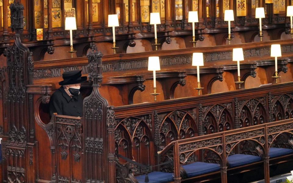 The Queen sat alone in St George's Chapel for the funeral of Prince Philip - Jonathan Brady/PA