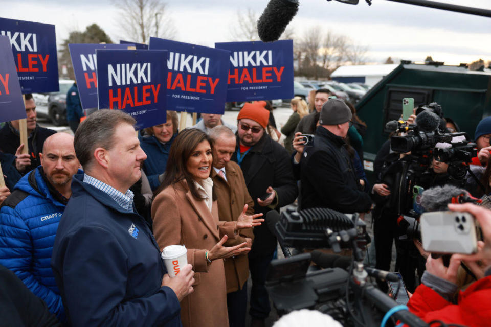 Republican presidential candidate Nikki Haley speaks with the media as she visits a polling location at Winnacunnet High School on Jan. 23, 2024, in Hampton, New Hampshire. / Credit: Joe Raedle/Getty Images