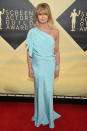 <p>Hawn stunned in a one-shouldered light teal gown. (Photo: Getty Images) </p>