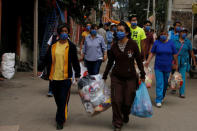 People distribute goods to fellow residents following the earthquake in Xochimilco, on the outskirts of Mexico City, Mexico September 25, 2017. REUTERS/Carlos Jasso