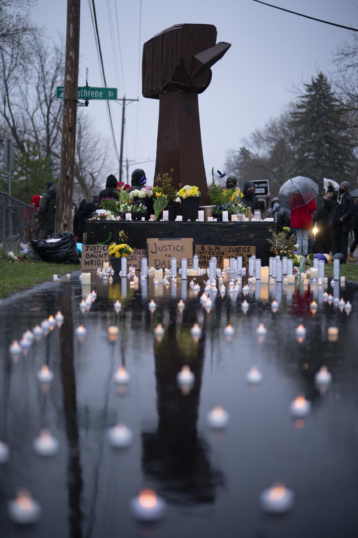 The community responded to the police killing of 20-year-old Daunte Wright with hundreds joining his family for a vigil on Monday, April 12, 2021, at the location on 63 Ave. N. in Brooklyn Center, Minn., where Wright was killed.