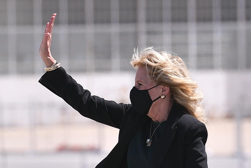 First lady Jill Biden boards a plane before departing from Meadows Field Airport in Bakersfield, Calif., Thursday, April 1, 2021. (Mandel Ngan/Pool via AP)