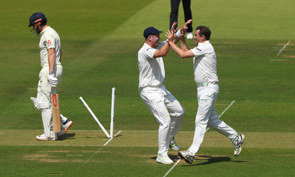 LONDON, ENGLAND - JULY 24: Ireland bowler Tim Murtagh celebrates with team mates after dismissing Jonny Bairstow during day one of the Specsavers Test Match between England and Ireland at Lord's Cricket Ground on July 24, 2019 in London, England. (Photo by Stu Forster/Getty Images)