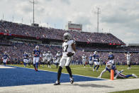 Las Vegas Raiders' Davante Adams (17) celebrates after scoring a touchdown during the first half of an NFL football game against the Buffalo Bills, Sunday, Sept. 17, 2023, in Orchard Park, N.Y. (AP Photo/Adrian Kraus)