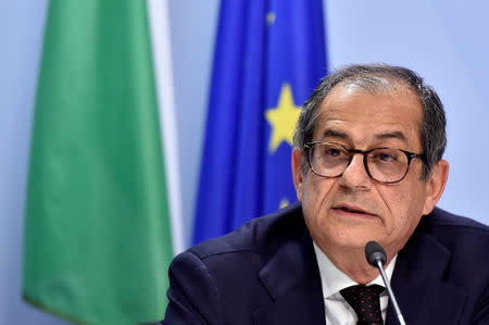 FILE PHOTO: Italian Economy Minister Giovanni Tria holds a news conference after a Euro zone finance ministers meeting in Brussels, Belgium November 19, 2018. REUTERS/Eric Vidal/File Photo