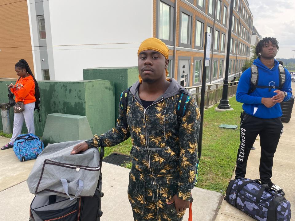 FAMU sophomore Brandon Haywood stands in front of FAMU Towers as he gets ready to head home for spring break.