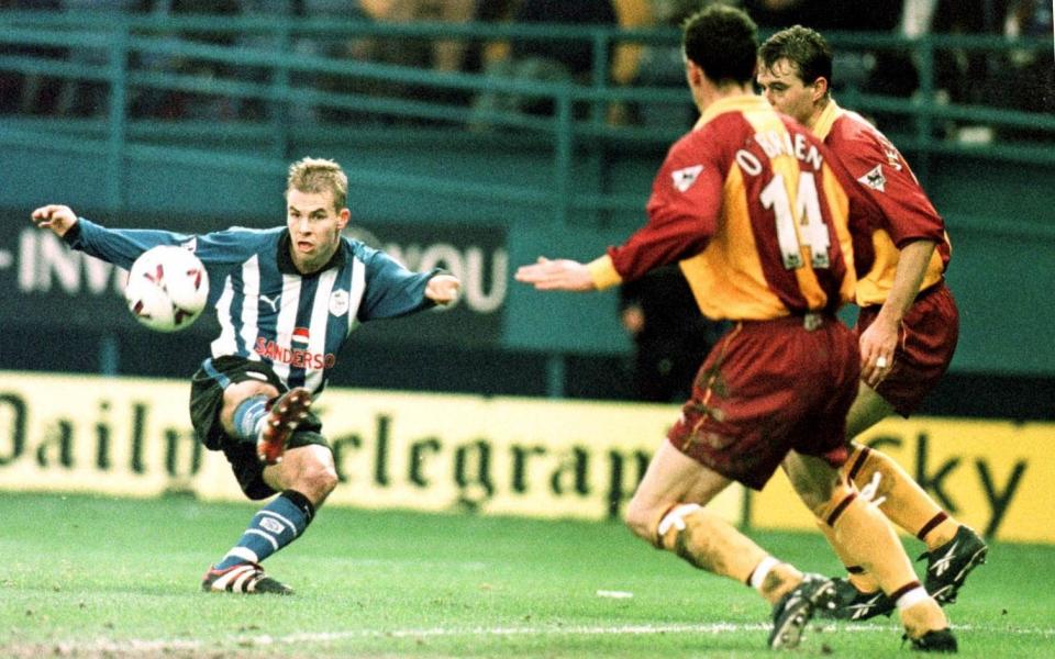 Sheffield Wednesday and Bradford are also part of the Yorkshire rivalries - and seen here clashing in the Premier League back in 2000 - PA