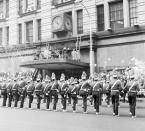 <p>A marching band performs in front of Macy's at the 1954 parade.</p>