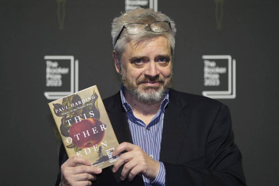 American author Paul Harding poses with his book "This Other Eden" during a photocall with the six shortlisted authors for the Booker Prize 2023, in London, Thursday, Nov. 23, 2023 ahead of the award ceremony on Nov. 26 in London. (AP Photo/Kin Cheung)