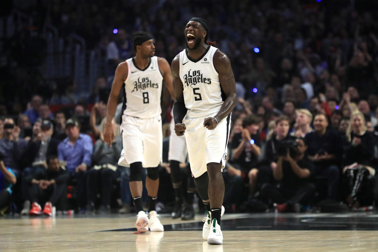 LOS ANGELES, CALIFORNIA - NOVEMBER 22:  Montrezl Harrell #5 reacts to scoring as Maurice Harkless #8 of the Los Angeles Clippers looks on during the first half of a game against the Houston Rockets at Staples Center on November 22, 2019 in Los Angeles, California.  NOTE TO USER: User expressly acknowledges and agrees that, by downloading and/or using this photograph, user is consenting to the terms and conditions of the Getty Images License Agreement (Photo by Sean M. Haffey/Getty Images)