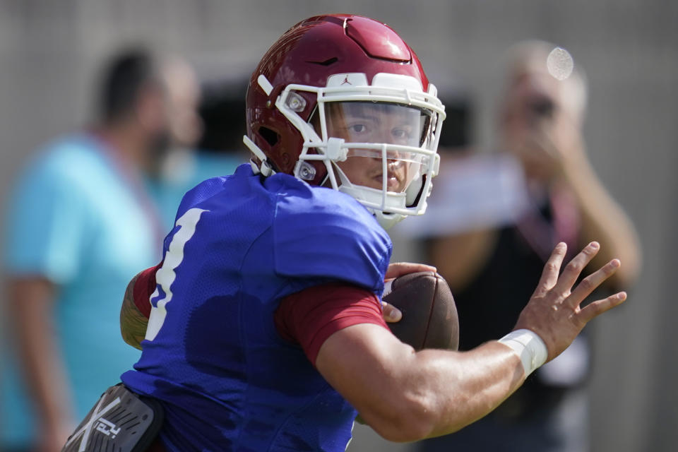 FILE - Oklahoma quarterback Dillon Gabriel throws during an NCAA college football practice, Monday, Aug. 8, 2022, in Norman, Okla. The Sooners have a new quarterback in Central Florida transfer Dillon Gabriel. (AP Photo/Sue Ogrocki, File)