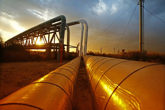 An energy pipeline at sunset.