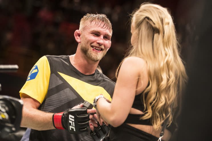 UFC light heavyweight Alexander Gustafsson proposes to girlfriend Moa Johansson after knocking out Glover Teixeira Sunday in Stockholm, Sweden. (Getty Images)