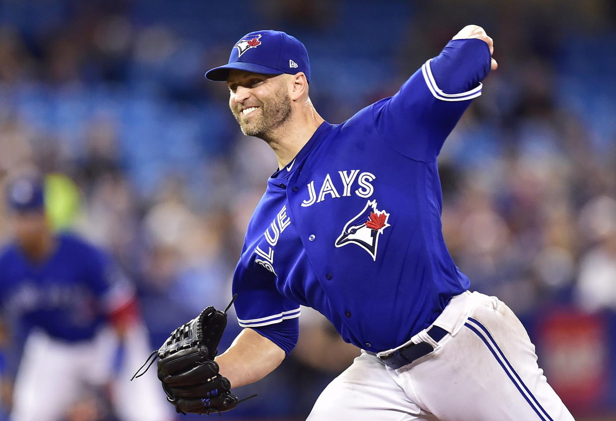 Veteran pitcher J.A. Happ was traded to the ..... on ..... (AP)