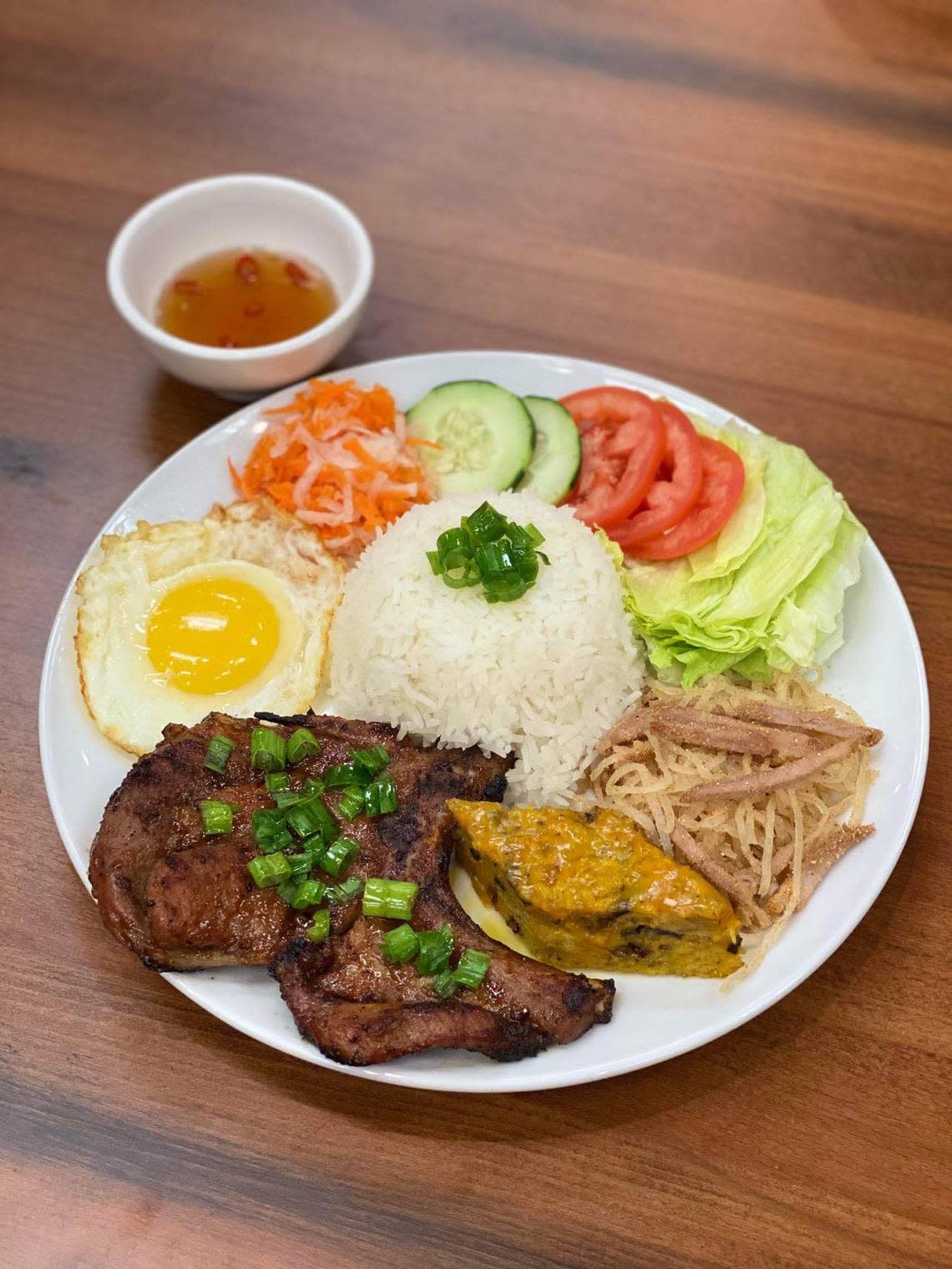 The Special Rice Platter ($15.49) is steamed rice with pork chop, shredded pork, Vietnamese steamed meatloaf and an egg served sunny-side up.