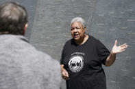 Cauline Yates, descendant of one of Thomas Jefferson's slave mistresses, talks about the Memorial to Enslaved Laborers at the University of Virginia in Charlottesville, Va., Thursday, May 6, 2021. In Virginia, a new law mandates the state’s five public colleges provide “tangible benefits” for slave descendants. (AP Photo/Steve Helber)