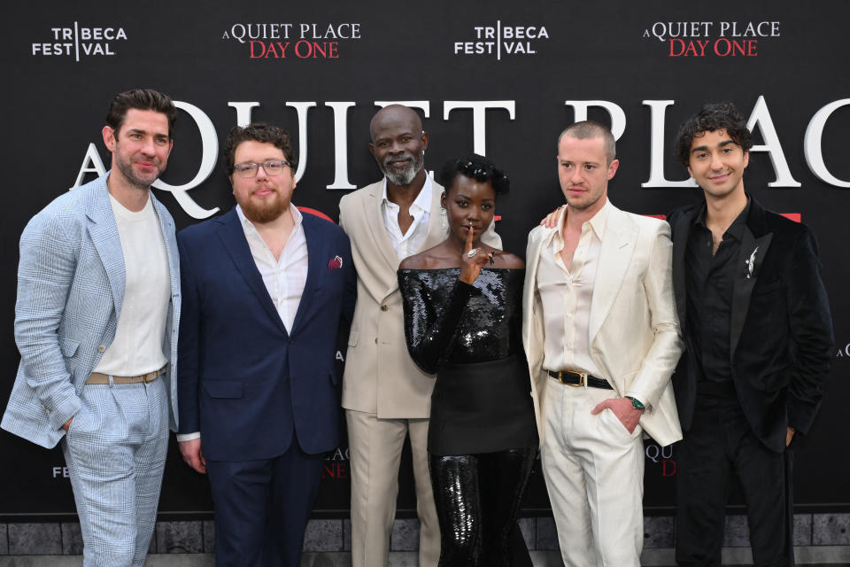 (L-R) Screen writer John Krasinski, director Michael Sarnoski, actors Djimon Hounsou, Lupita Nyong'o, Joseph Quinn and Alex Wolff attend the New York premiere of Paramount's "A Quiet Place: Day One" at AMC Lincoln Square Theater in New York on June 26, 2024. (Photo by ANGELA WEISS / AFP) (Photo by ANGELA WEISS/AFP via Getty Images)