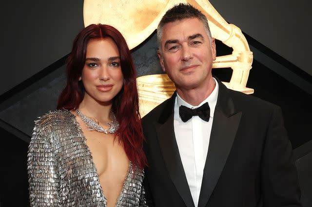 <p>Kevin Mazur/Getty</p> Dua Lipa and Dukagjin Lipa at the 2024 Grammys