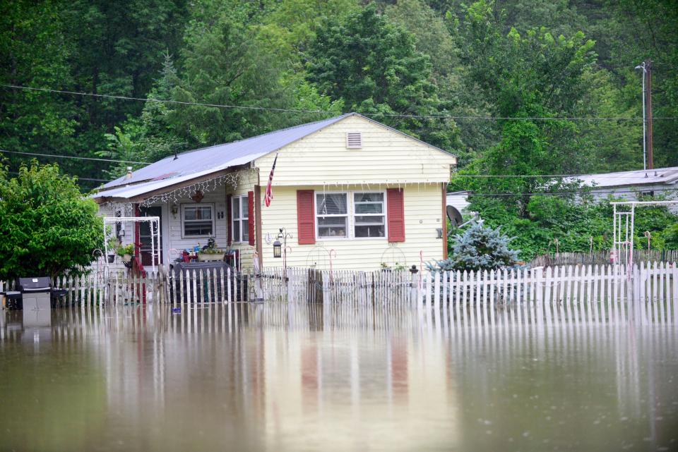 Trailers are evacuated at the Tri-Park Co-Op Housing in Brattleboro, Vt, as the water in the Whetstone Brook crests, Monday (AP)