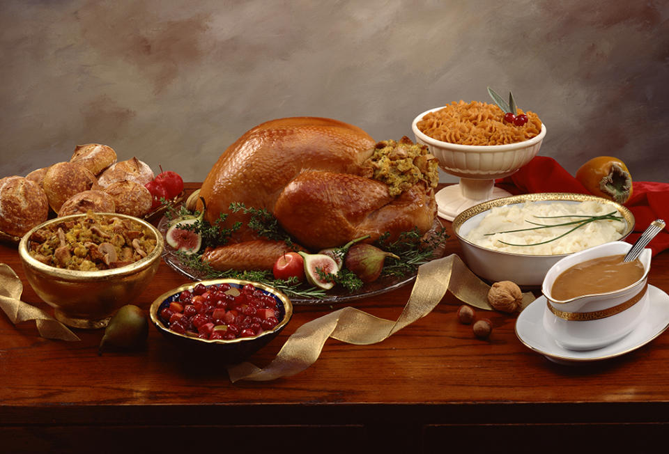 Here's what happens when you get carried away eating Thanksgiving dinner. (Photo: Getty Images)
